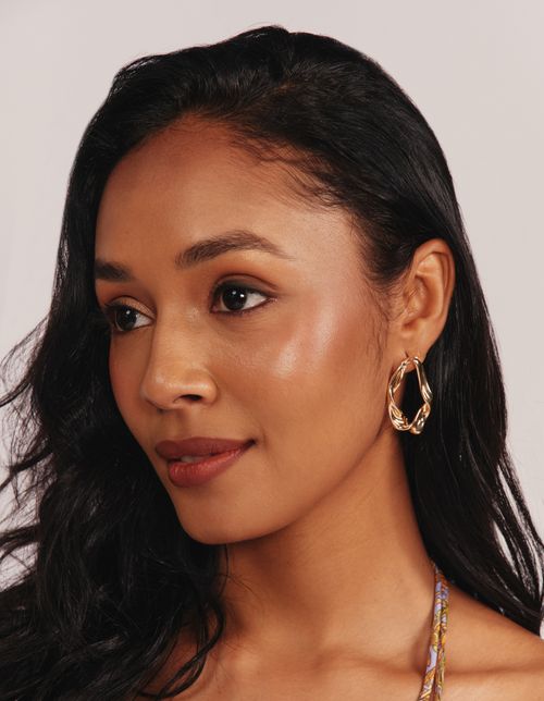 Brinco Organico Torcido - Dourado