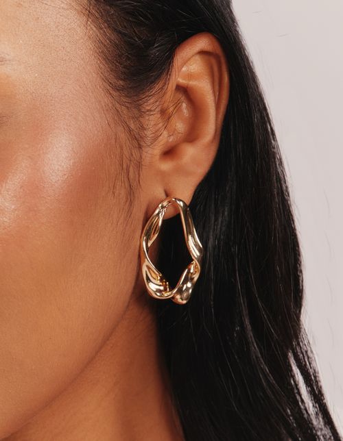 Brinco Organico Torcido - Dourado